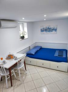 Posteľ alebo postele v izbe v ubytovaní STONE HOUSE Lovric