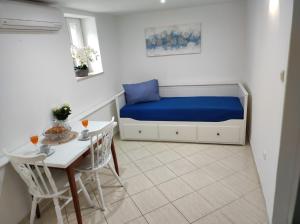 Posteľ alebo postele v izbe v ubytovaní STONE HOUSE Lovric