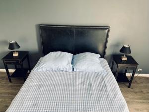 Кровать или кровати в номере DOMAINE LE CLOS