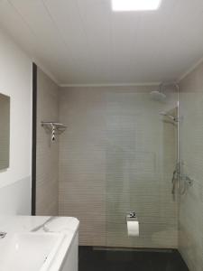 Ένα μπάνιο στο Ferienwohnung Martin