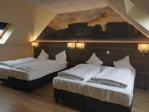 Postel nebo postele na pokoji v ubytování Hotel Albert II Oostende