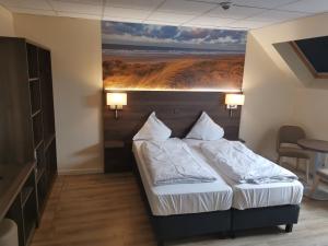 Postel nebo postele na pokoji v ubytování Hotel Albert II Oostende