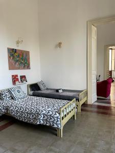 Кровать или кровати в номере Casa Proserpina