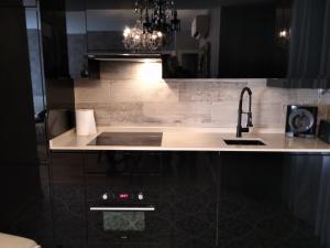 a kitchen with a sink and a counter top at VIP ROOMS Toledo - PARKING GRATIS - 2 HABITACIONES in Toledo +22 photos
