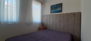 A bed or beds in a room at Mert Apart Még 1 kép