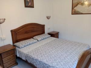 Postel nebo postele na pokoji v ubytování Noemi Apartment 5 Lands Paradise