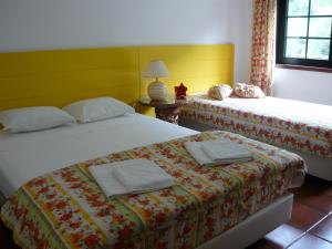 เตียงในห้องที่ Casa do Riacho