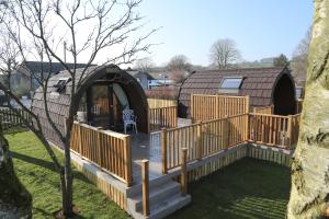 a deck with a yurt in a yard at The Kellbank in Gosforth
