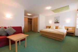 Ένα ή περισσότερα κρεβάτια σε δωμάτιο στο Haus Walser