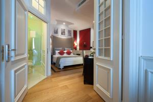 Posteľ alebo postele v izbe v ubytovaní Hotel Bologna ***S