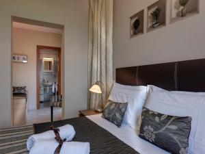 A bed or beds in a room at Amoliv