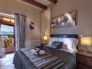 A bed or beds in a room at Amoliv