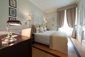 Posteľ alebo postele v izbe v ubytovaní Hotel Bologna ***S