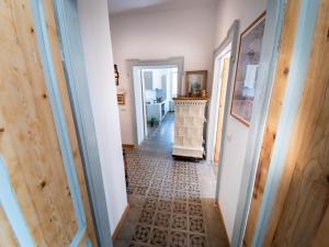 a hallway with a tile floor in a house at VILLA SILVIA-by Home Sitter Como in Como