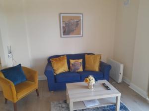 Зона вітальні в Delphi Cottage