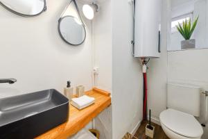 Koupelna v ubytování Instant de douceur au pied des Thermes