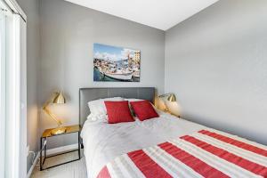 Postel nebo postele na pokoji v ubytování Oceanside Oasis