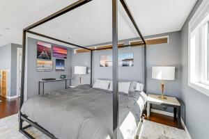 Postel nebo postele na pokoji v ubytování Oceanside Oasis