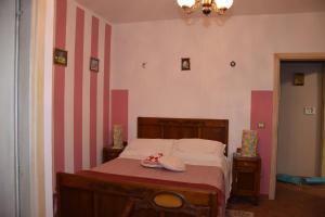 Posteľ alebo postele v izbe v ubytovaní Agriturismo Maria Cristina