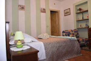 Posteľ alebo postele v izbe v ubytovaní Agriturismo Maria Cristina