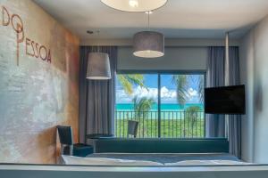 a hotel room with a view of the ocean at Vila Galé Resort Alagoas - All Inclusive in Barra de Santo Antônio