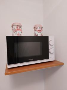 Kuchyň nebo kuchyňský kout v ubytování Apartmani Ana