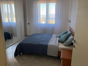 Postel nebo postele na pokoji v ubytování Apartment Spiaggia d’Oro