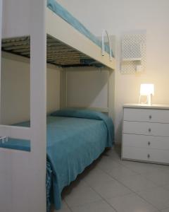 Una cama o camas cuchetas en una habitación  de Arborea Apartment 58 Sea View