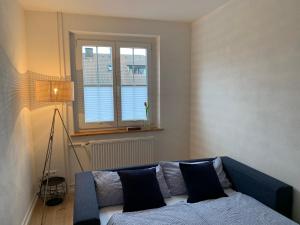 Ένα ή περισσότερα κρεβάτια σε δωμάτιο στο Ferienwohnungen Bohner/ Wohnung Katharina