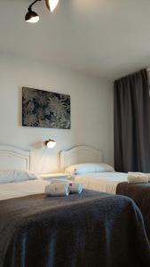 Posteľ alebo postele v izbe v ubytovaní Best View - Welcome Penthouse Apartamentos Karola
