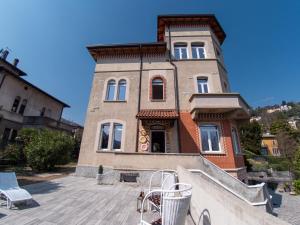 a building with a staircase in front of it at VILLA SILVIA-by Home Sitter Como in Como