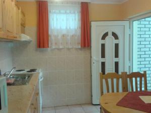 Kuchyň nebo kuchyňský kout v ubytování Levendula Apartman