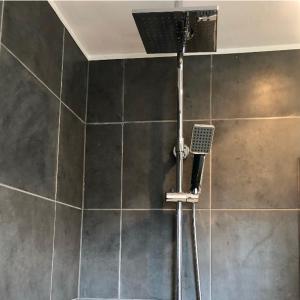 a shower in a bathroom with a shower at Summerville in Kent