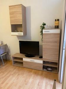 TV a/nebo společenská místnost v ubytování La casetta di Gnappi