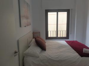 Cama o camas de una habitación en Fantastico Apto frente al Puerto de Fuengirola...