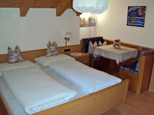 Postel nebo postele na pokoji v ubytování Gandlerhof