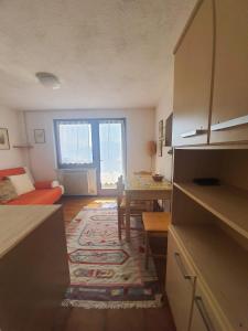 A bed or beds in a room at Apartment San Giacomo - Brentonico