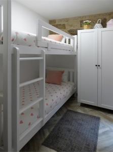 Postel nebo postele na pokoji v ubytování Casa Veiga 1