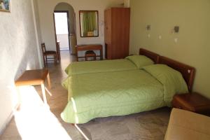 Кровать или кровати в номере Hotel Philoxenia