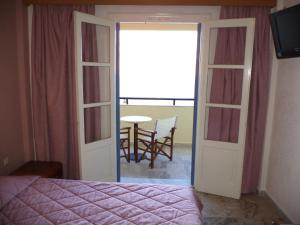 Кровать или кровати в номере Hotel Philoxenia