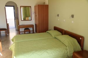 Кровать или кровати в номере Hotel Philoxenia