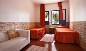 Postel nebo postele na pokoji v ubytování Hotel Atalaya