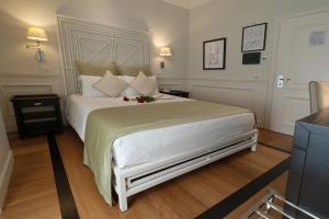 Posteľ alebo postele v izbe v ubytovaní Hotel Bologna ***S