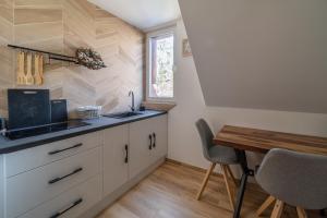 A cozinha ou cozinha compacta de Skalna Rezydencja