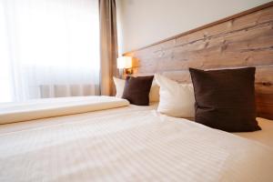Postel nebo postele na pokoji v ubytování Hotel Nahetal