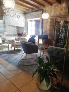 Posedenie v ubytovaní Hostal Pension Artilleiro