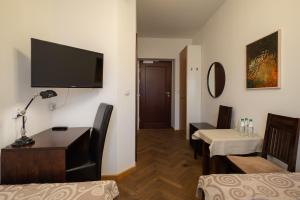 Posteľ alebo postele v izbe v ubytovaní Hotel Beskid
