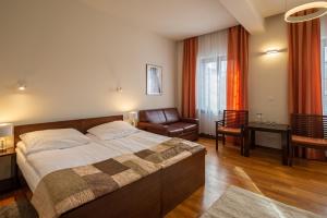 Posteľ alebo postele v izbe v ubytovaní Hotel Beskid