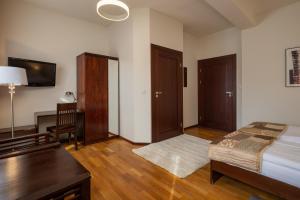 Posteľ alebo postele v izbe v ubytovaní Hotel Beskid