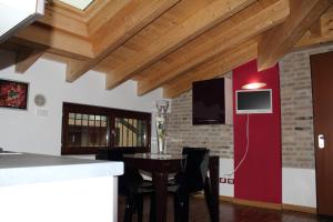 A television and/or entertainment centre at Maison d'Elite